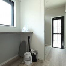 ランドリーのカウンターはご主人でもアイロンがかけやすい高さが基準