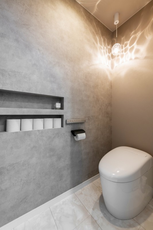 統一感のあるカラーリングで演出された癒しのレストルーム