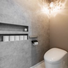 統一感のあるカラーリングで演出された癒しのレストルーム